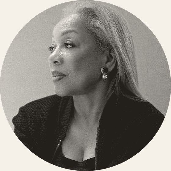 Rita Coburn, photographed in three-quarter profile.